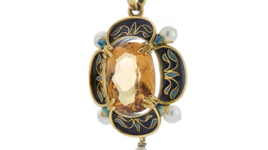 Antique Victorian Citrine, Enamel, Pearl and 15ct Gold Pendant; central 8.00 carat oval faceted citrine, the black enamel surround with blue enamel highlights and pearl accents. Made in England, Circa 1870s