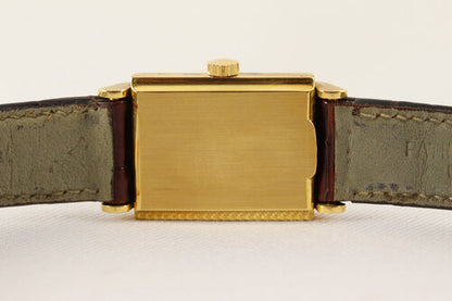 Patek Philippe Vintage Rectangular 18ct Yellow Gold Manual Watch, Ref 1531, silver dial, small seconds subdial at 6, Patek Philippe brown leather strap, with service papers, Circa 1940-50s