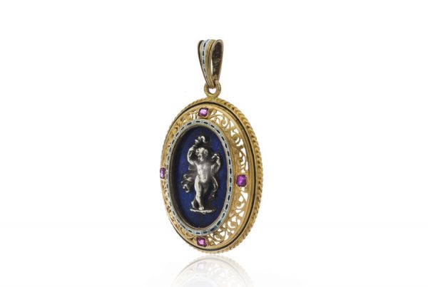 Antique Italian 18ct Yellow Gold Pendant in the style of Castellani; featuring a silver cherub on lapis lazuli, in 18ct pierced surround accented with rubies, Circa 1850-1870s