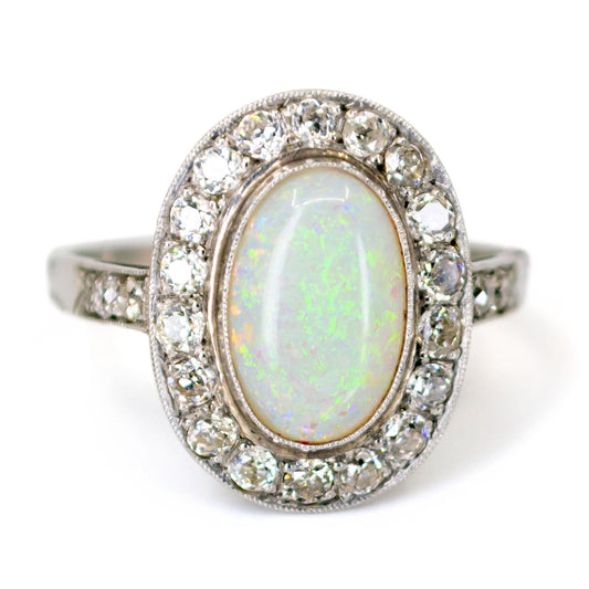Oval Opal and Old Mine Cut Diamond Cluster Engagement Ring in Platinum 