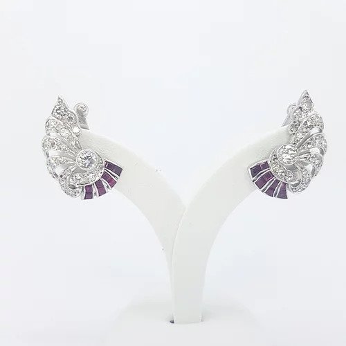 Art Deco Old Cut Diamond and Ruby Spray Earrings, with a fluid geometric spray form, set with old cut diamonds and square step-cut rubies, in 18ct white gold