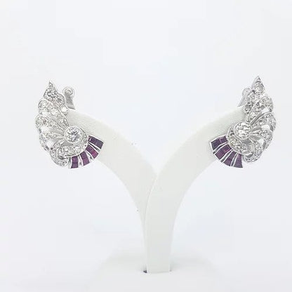 Art Deco Old Cut Diamond and Ruby Spray Earrings, with a fluid geometric spray form, set with old cut diamonds and square step-cut rubies, in 18ct white gold