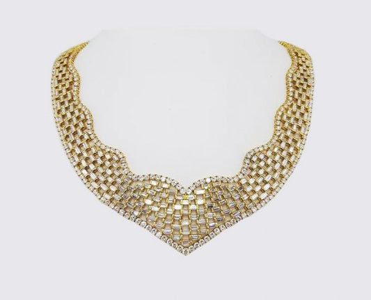 Exceptional Diamond and 18ct Gold Collar Necklace; A stunning flexible collar necklace set with baguette-cut diamonds, 52.93 carat total, 18ct yellow gold