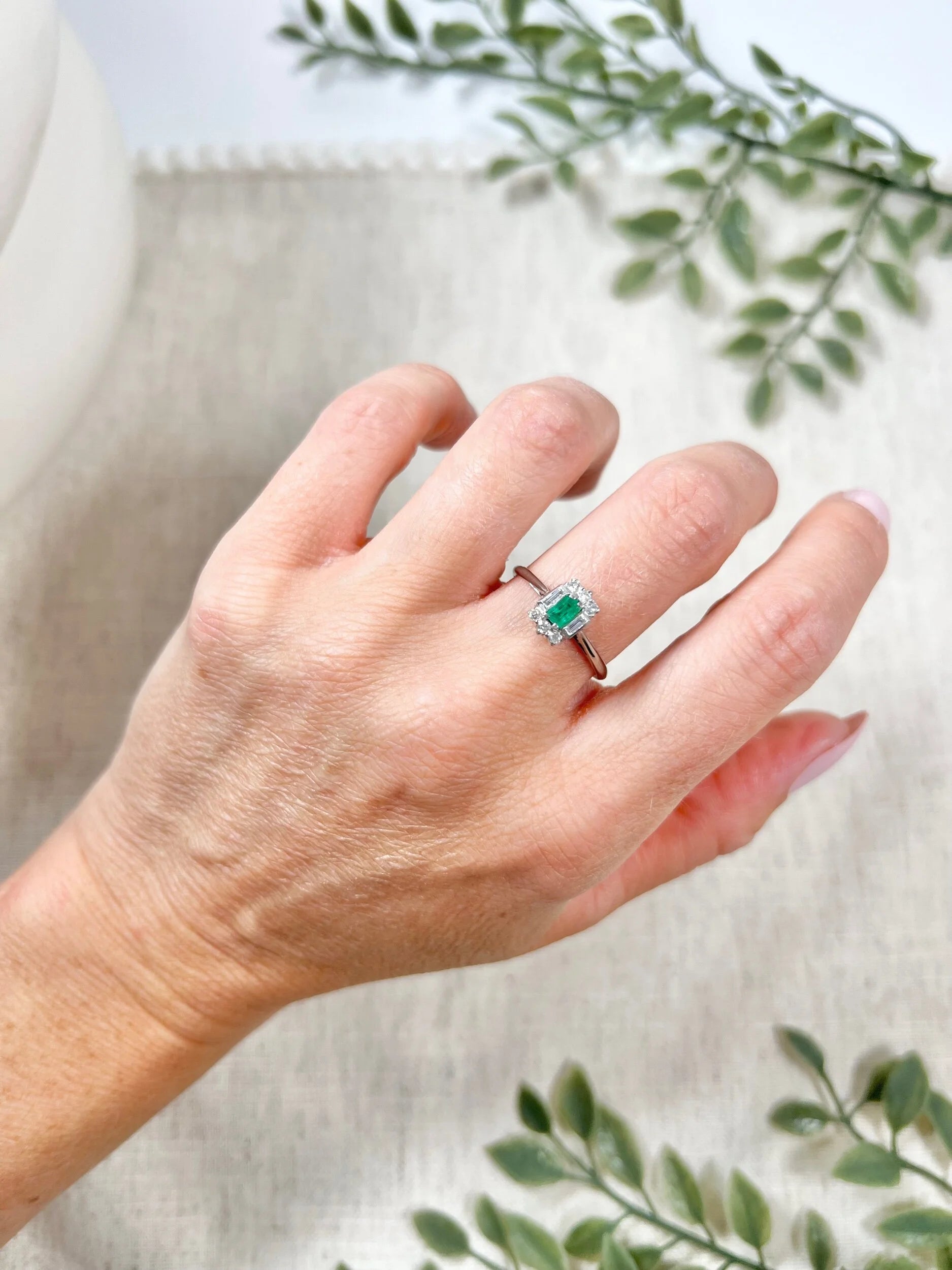 Vintage 18 Carat White Gold Emerald Cut Emerald and Diamond Cluster Ring, Circa 1940