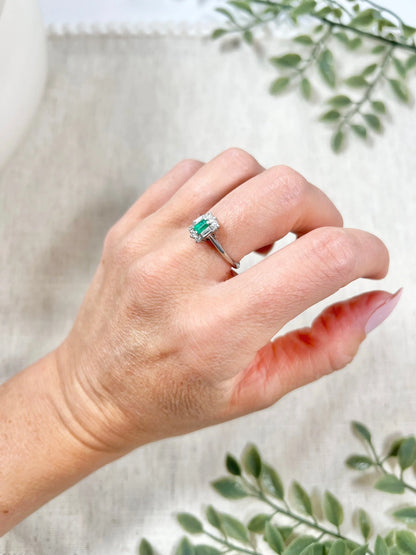Vintage 18 Carat White Gold Emerald Cut Emerald and Diamond Cluster Ring, Circa 1940