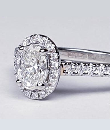 0.50ct Oval Cut Diamond Cluster Engagement Ring in Platinum with GIA Certificate