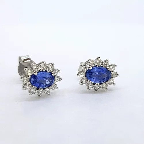 Sapphire and Diamond Oval Cluster Stud Earrings; featuring 1ct oval faceted Sri Lankan blue sapphires set within a cluster of 0.50cts diamonds, in 18ct white gold