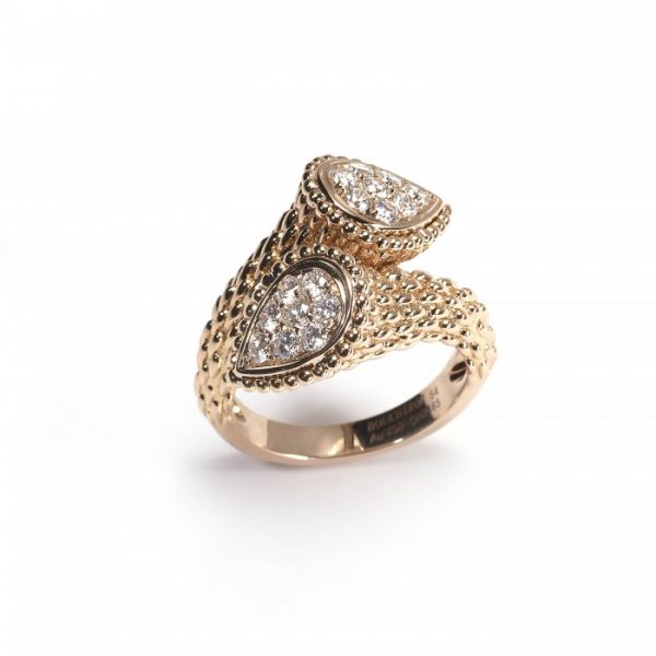 Boucheron Serpent Boheme Diamond Ring; formed of two pear-shaped sections pavé set with sixteen round brilliant-cut diamonds, 0.65cts, in a cross-over design, scale-like detailing to 18ct rose gold shank. Stamped Boucheron with number OR2465. Circa 2010