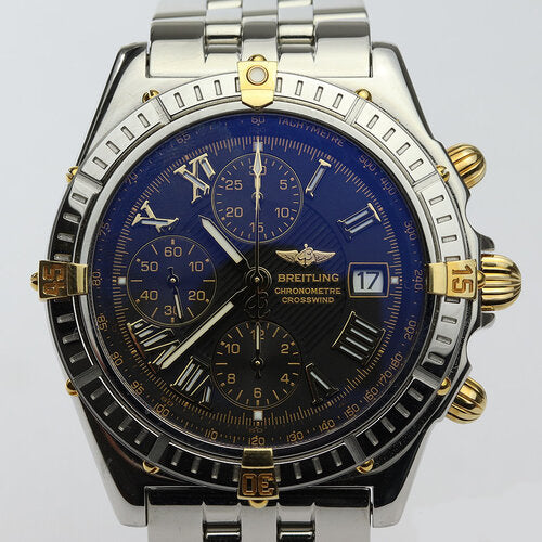 Breitling Crosswind Racing Chronograph 43mm Steel and Gold Automatic Watch, B13355, black dial, Roman numerals, date indicator, rotating bezel, sapphire crystal, screw-down crown, Stainless steel bracelet with fold over clasp, with Breitling box and papers.