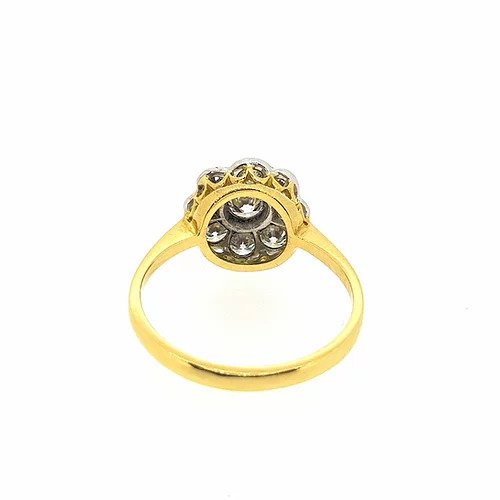 1.25ct Diamond Daisy Floral Cluster Ring; central round cut diamond encompassed by eight further diamonds, collet set, 18ct yellow gold shank