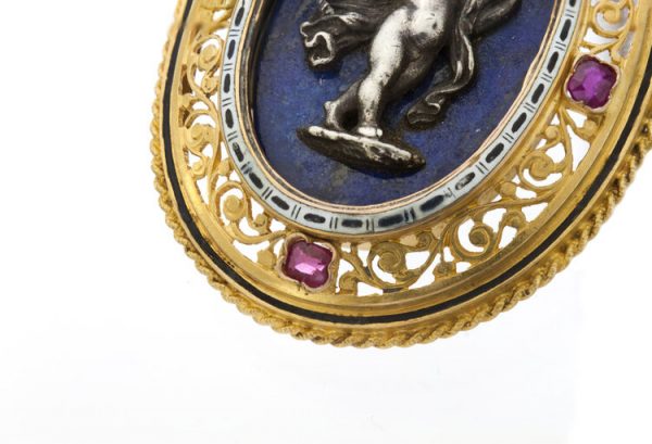 Antique Italian 18ct Yellow Gold Pendant in the style of Castellani; featuring a silver cherub on lapis lazuli, in 18ct pierced surround accented with rubies, Circa 1850-1870s