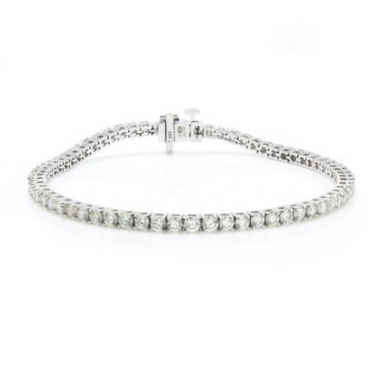 Diamond Line Tennis Bracelet in 18ct White Gold, claw set with 4.64 carats of VS1 F/G colour diamonds. Made in Birmingham, Maker AE