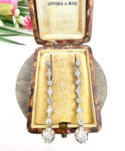 A pair of diamond drop earrings in yellow gold and platinum, in an antique box