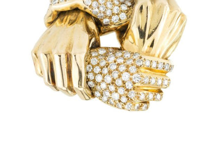 Vintage French Diamond and 18ct Gold Four Hand Symbol Pendant, four interlocking hands crafted from 18ct yellow gold set with 3.00 carats round brilliant-cut diamonds, Circa 1970s