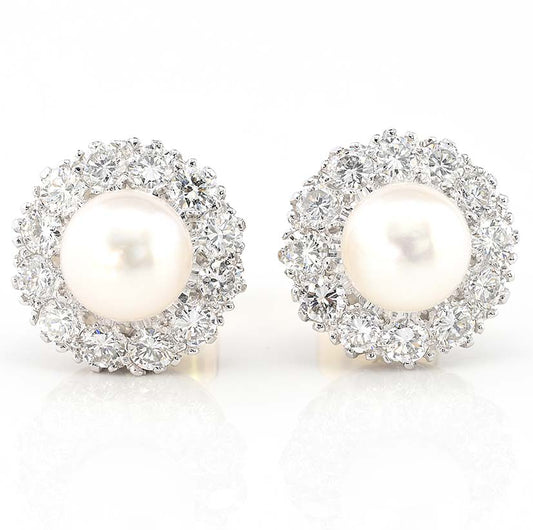 Vintage Pearl and Diamond Cluster Stud Earrings, 8mm white silvery natural saltwater cultured pearls surrounded by 2.40 carats of round brilliant-cut diamonds in 18ct gold