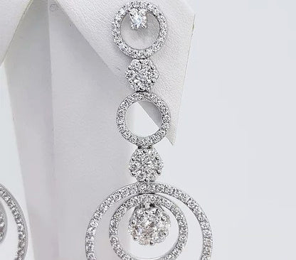 Contemporary 3ct Diamond Circular Drop Earrings, comprising of diamond set circles and clusters, 3.00 carat total, in 18ct white gold.