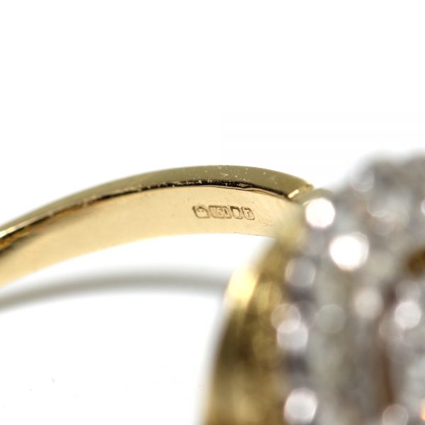 Diamond Floral Cluster Ring; 1.38 carat total, central 0.40ct G VS1 brilliant-cut diamond within diamond fixed halo surround, in 18ct yellow gold