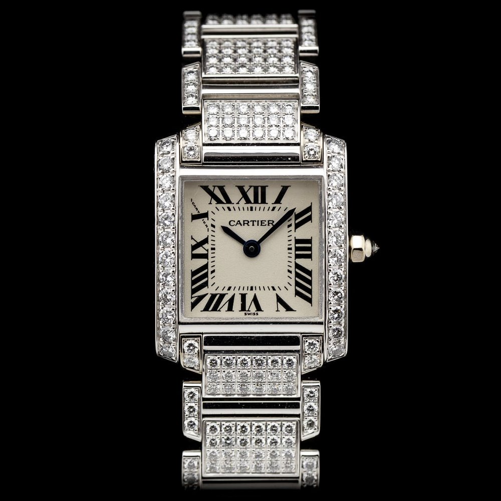 Cartier Tank Francaise 2365 White Gold Factory Diamonds Watch with Cartier service 2024, fully loaded set with approx. 6 carats of top colour and clarity round brilliant cut diamonds. Presented in its Cartier box along with a Cartier service warranty certificate from 2024 2 year warranty from Cartier