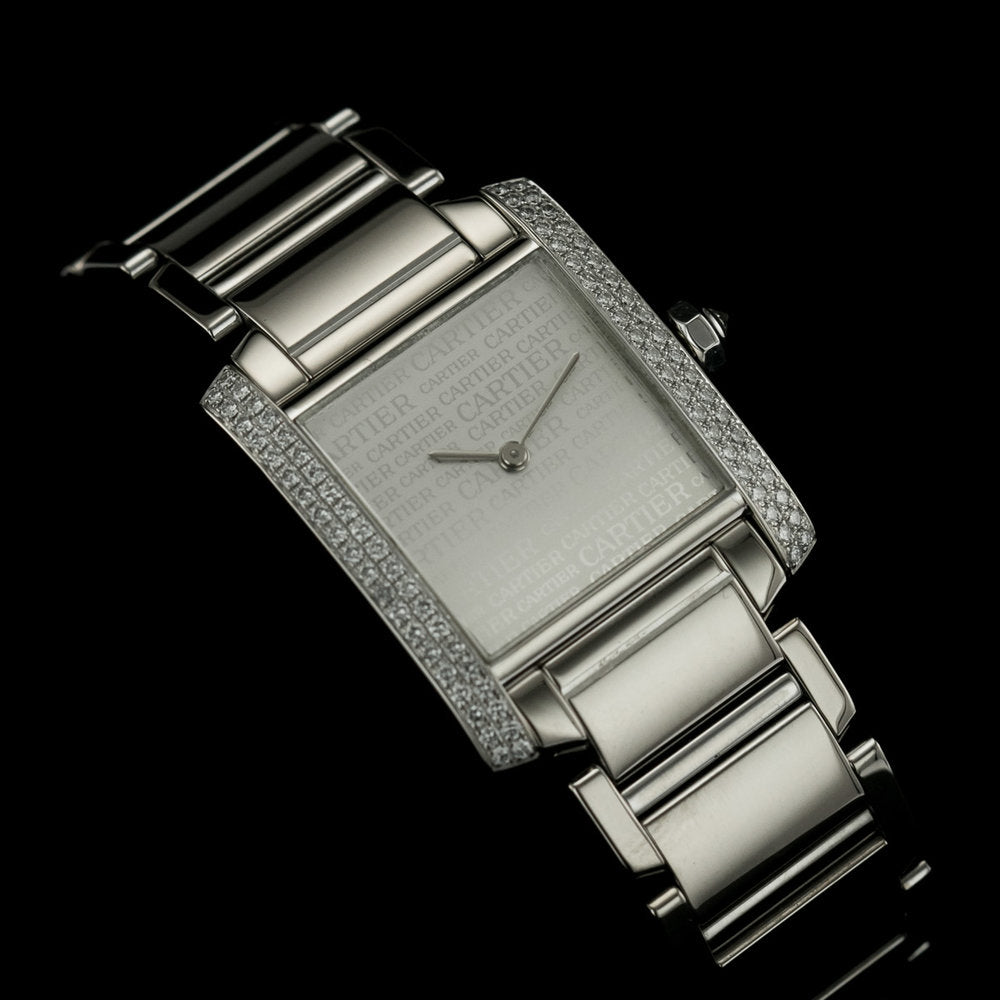 Cartier Tank Francaise 18ct White Gold WE101853 Factory Diamond Watch with factory set diamond case and limited production silver Cartier Boutique dial in original red Cartier box, with instruction booklet and stamped Cartier warranty papers dated 2010