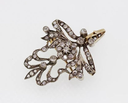 Art Nouveau Diamond set Brooch Pendant, with floral cluster, bow and swag detailing, in silver.