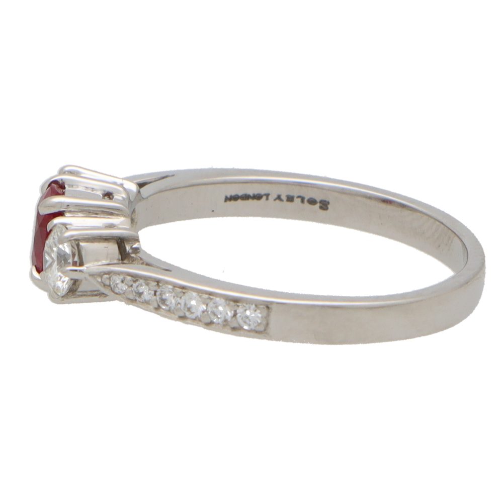 0.42ct Oval Ruby and Diamond Three Stone Engagement Ring in Platinum