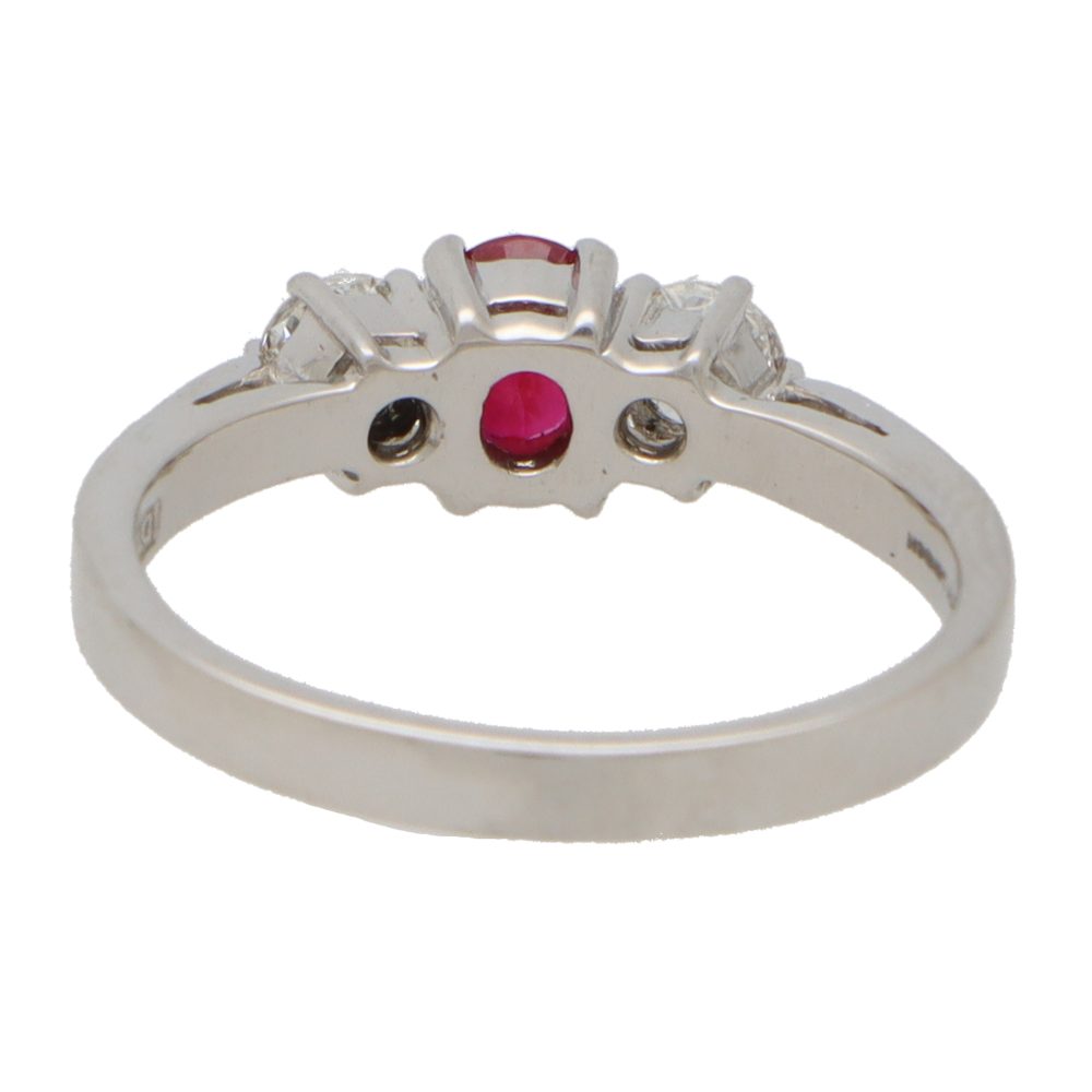 0.42ct Oval Ruby and Diamond Three Stone Engagement Ring in Platinum