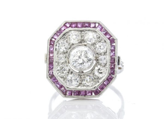 Late Art Deco Diamond, Ruby and Platinum Cluster Ring; with 1.45cts old and brilliant-cut diamonds and 0.68cts square cut rubies, Circa 1930