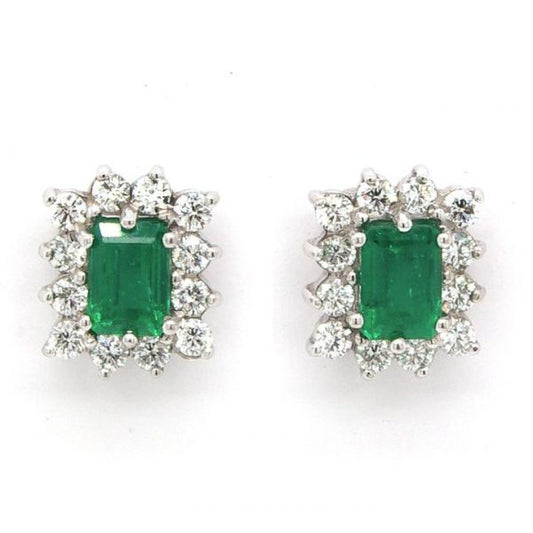 Pair of 1.28ct Emerald and 0.68ct Diamond Cluster Earrings; emerald-cut emerald set within a surround of brilliant cut diamonds, 18ct white and yellow gold.