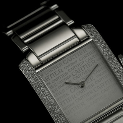 Cartier Tank Francaise 18ct White Gold WE101853 Factory Diamond Watch with factory set diamond case and limited production silver Cartier Boutique dial in original red Cartier box, with instruction booklet and stamped Cartier warranty papers dated 2010