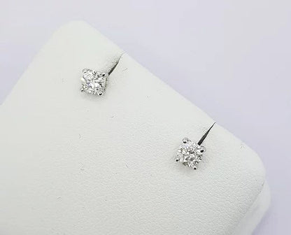 Pair of Diamond Solitaire Stud Earrings, 0.50 carat total, in 18ct white gold