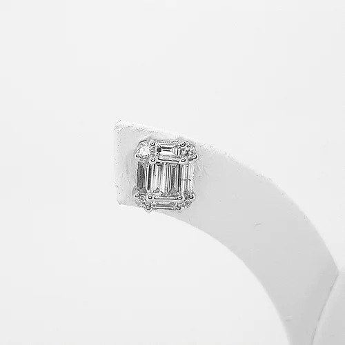 Baguette Cut Diamond Stud Earrings; central baguette-cut diamond with a baguette cut diamond surround accented with brilliant cut diamonds at each corner, 0.77 carat total, in 18ct white gold