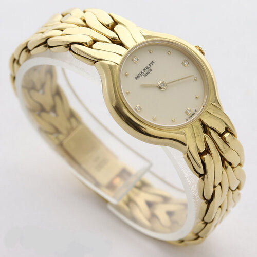 Patek Philippe La Flamme Ladies 18ct Yellow Gold 23mm Diamond Dial Quartz Watch, off-white/cream dial, four diamond hour markers, 18ct yellow gold bracelet with small fold-over clasp
