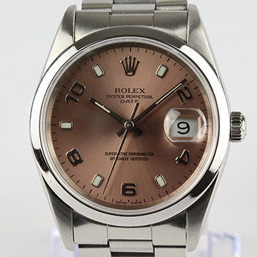 Rolex Oyster Perpetual Date 34mm Steel 15200 Automatic Watch with Copper Dial, 5 Arabic numerals and date indicator at 3 hour mark, on a stainless steel Oyster bracelet