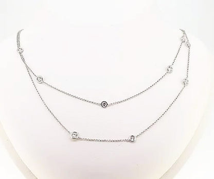 Brilliant-Cut Diamond Long Chain Necklace; An 18ct white gold chain interspersed with collet-set round brilliant-cut diamonds, 2.71 carat total.