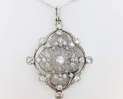 Antique Old Cut Diamond set Pendant; openwork pendant set with old cut diamonds, believed to be from the Edwardian era, 18ct white gold.