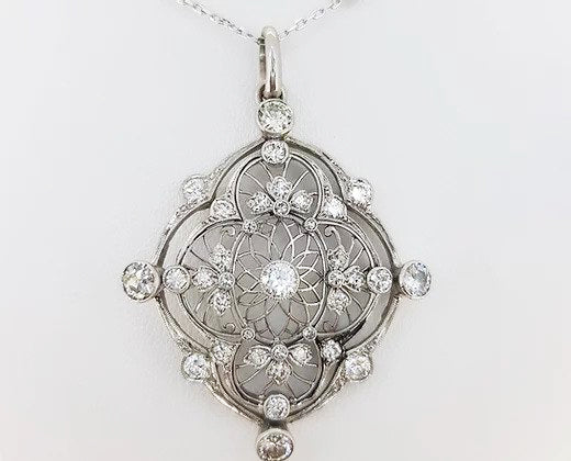 Antique Old Cut Diamond set Pendant; openwork pendant set with old cut diamonds, believed to be from the Edwardian era, 18ct white gold.