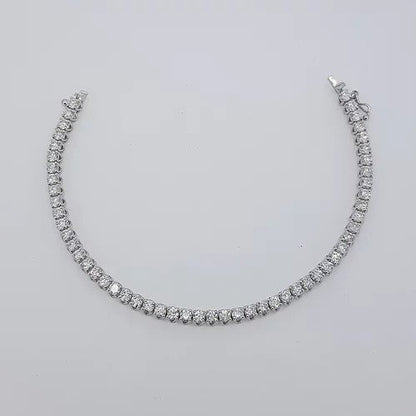 Diamond Line Bracelet in 18ct White Gold; featuring 6.22 carats of round brilliant-cut diamonds, each claw-set and mounted in 18ct white gold