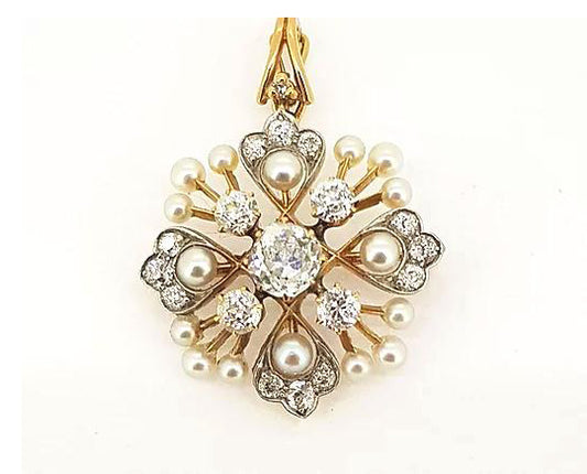Antique Natural Pearl and Old Cut Diamond Pendant Brooch; set in a floral starburst design, 18ct gold. Central diamond approx 1.00 carat.