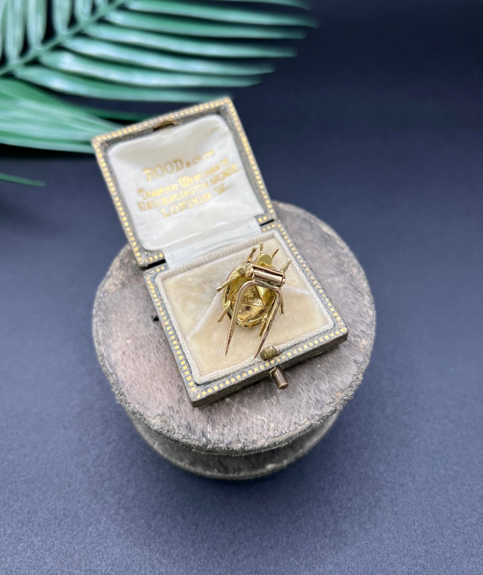 A yellow gold and enamel ladybird brooch