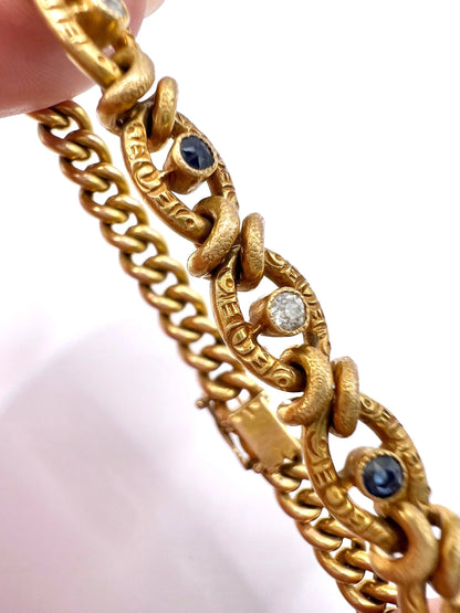 A sapphire and diamond fancy curb link bracelet in yellow gold