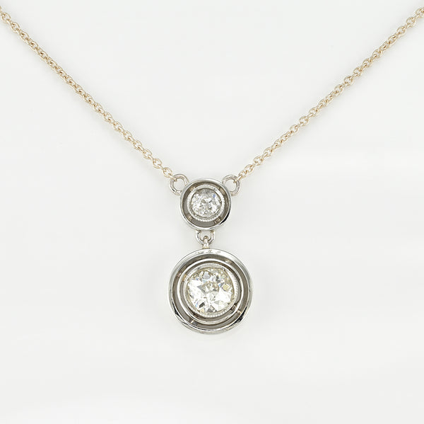 Art Deco 1.15ct Twin Old Cut Diamond Solitaire Target Pendant, 0.85ct old European-cut diamond topped with 0.30ct old mine-cut diamond in 18ct white gold target settings to fixed 18ct yellow gold trace chain