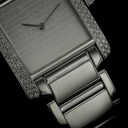 Cartier Tank Francaise 18ct White Gold WE101853 Factory Diamond Watch with factory set diamond case and limited production silver Cartier Boutique dial in original red Cartier box, with instruction booklet and stamped Cartier warranty papers dated 2010