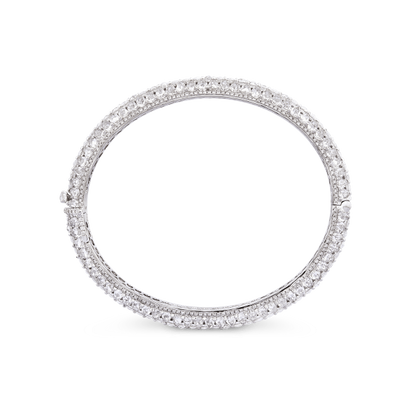 Rose Cut Diamond Bangle Bracelet; 9.72 carats oval and pear-shaped rose-cut diamonds, accented with 335 round brilliant diamonds, in 18ct white gold