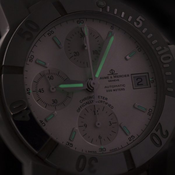 Baume and Mercier Capeland 44mm Stainless Steel Automatic Chronograph Watch, fluorescent hands and baton hour markers, stainless steel bracelet strap