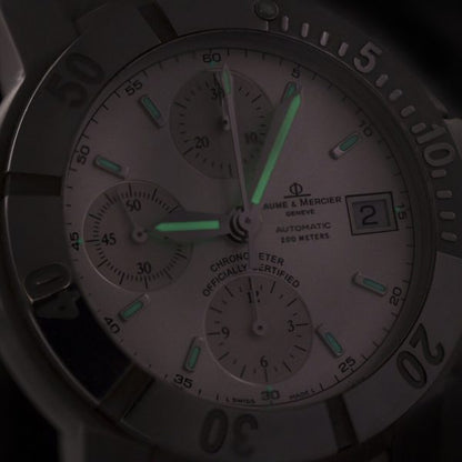 Baume and Mercier Capeland 44mm Stainless Steel Automatic Chronograph Watch, fluorescent hands and baton hour markers, stainless steel bracelet strap
