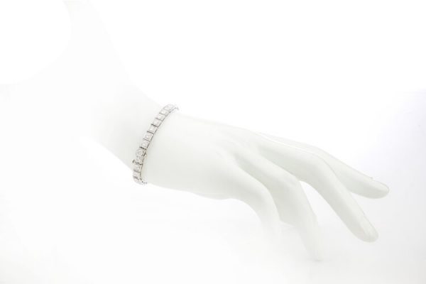 Cartier Vintage Diamond and Platinum Tennis Bracelet, 5.25 carat total, with Cartier box. Circa 1950s