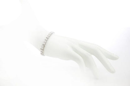 Cartier Vintage Diamond and Platinum Tennis Bracelet, 5.25 carat total, with Cartier box. Circa 1950s