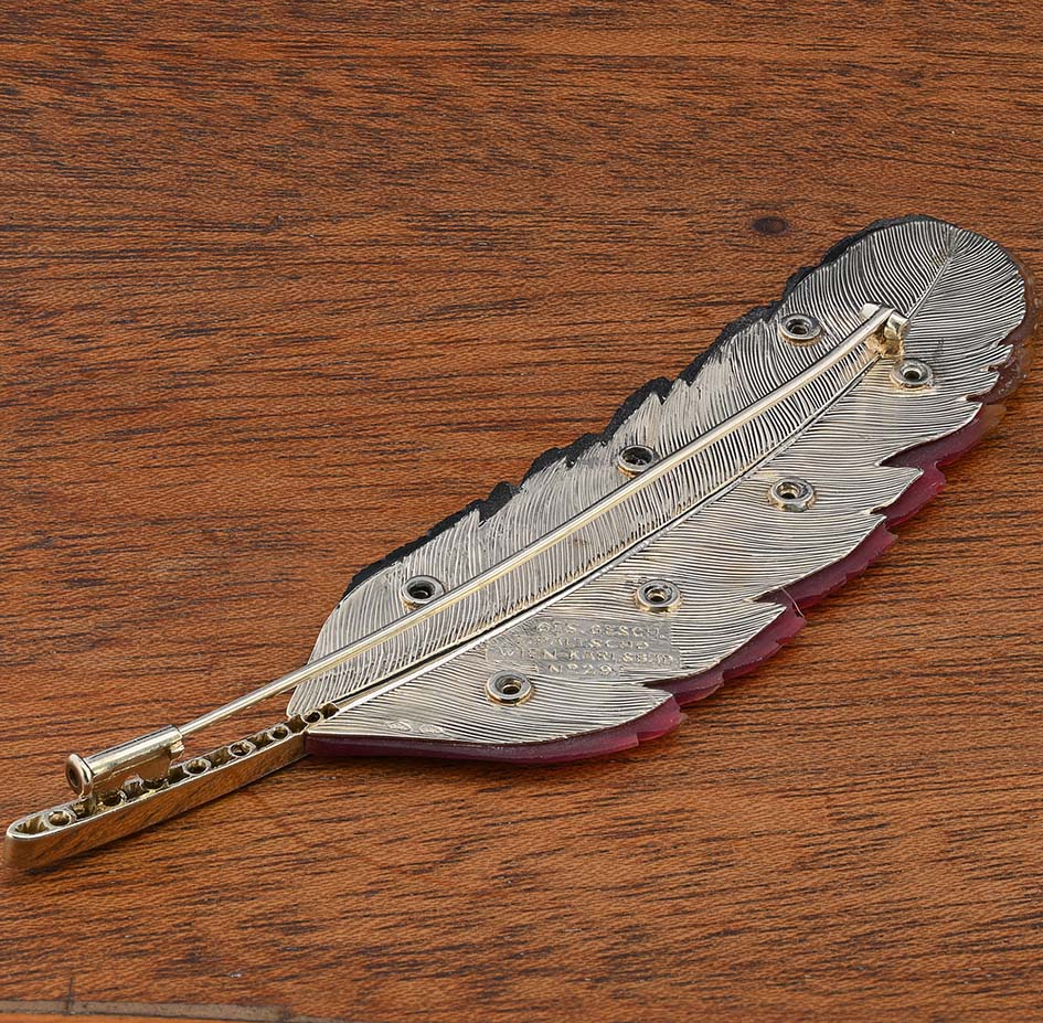 Art Deco Paltscho Vienna Red Chalcedony Black Onyx and Diamond Feather Brooch, carved red chalcedony and black onyx feather with diamond dots and rose-cut diamonds along the stem in 14ct white gold. Circa 1920. With Austro Hungarian marks of the period - Signed Ges. Gesh. (copyright) E. PALTSCHO – WIEN – KARLSBAD N. 29