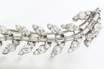 Old Cut Diamond and Platinum Spray Brooch; set with 5.80 carats of antique old cut diamonds, with later platinum setting