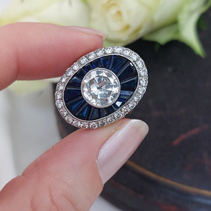 1.72ct Diamond and Calibre Sapphire Target Cluster Ring